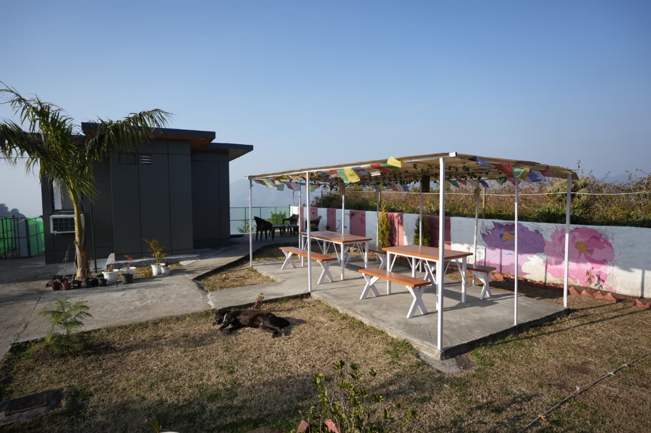 Outdoor dining area with Tibetan prayer flags